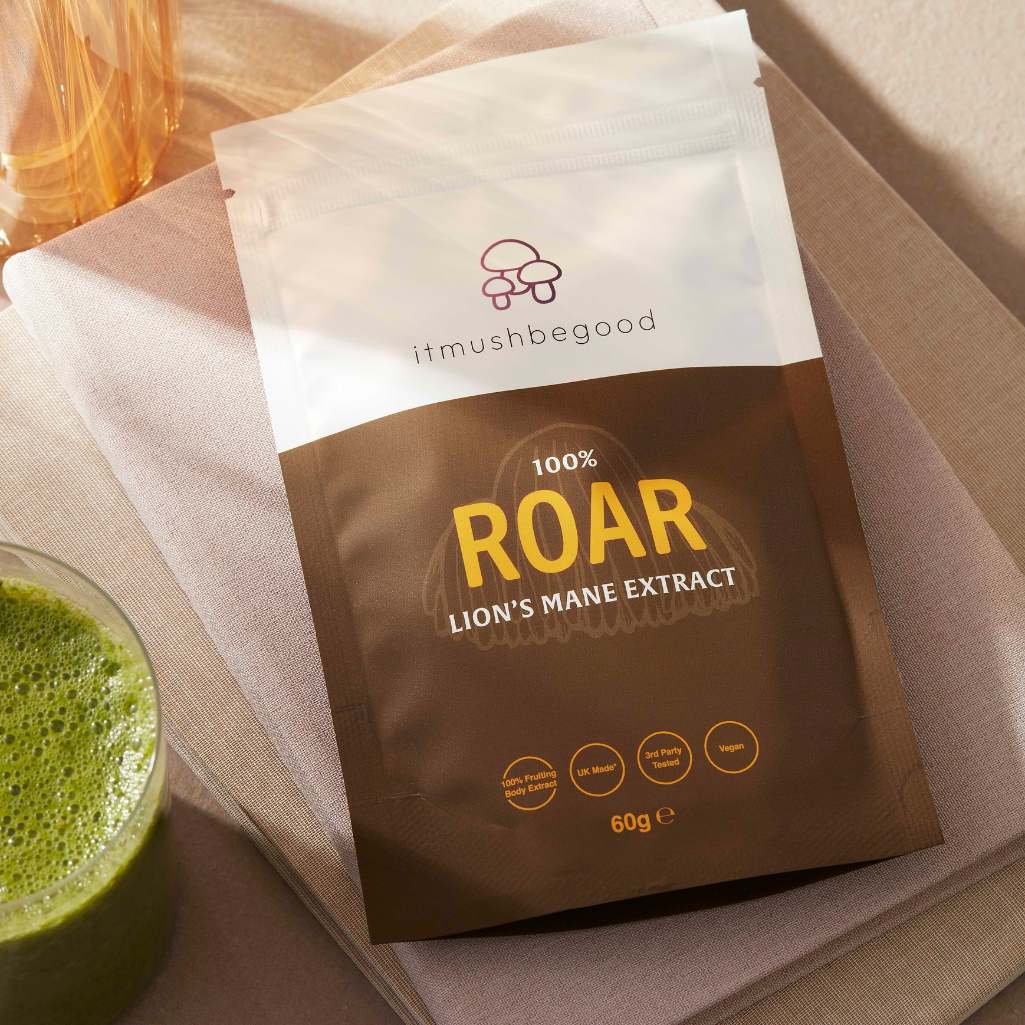 Roar Sachet Lying Down on Notebook Stack
