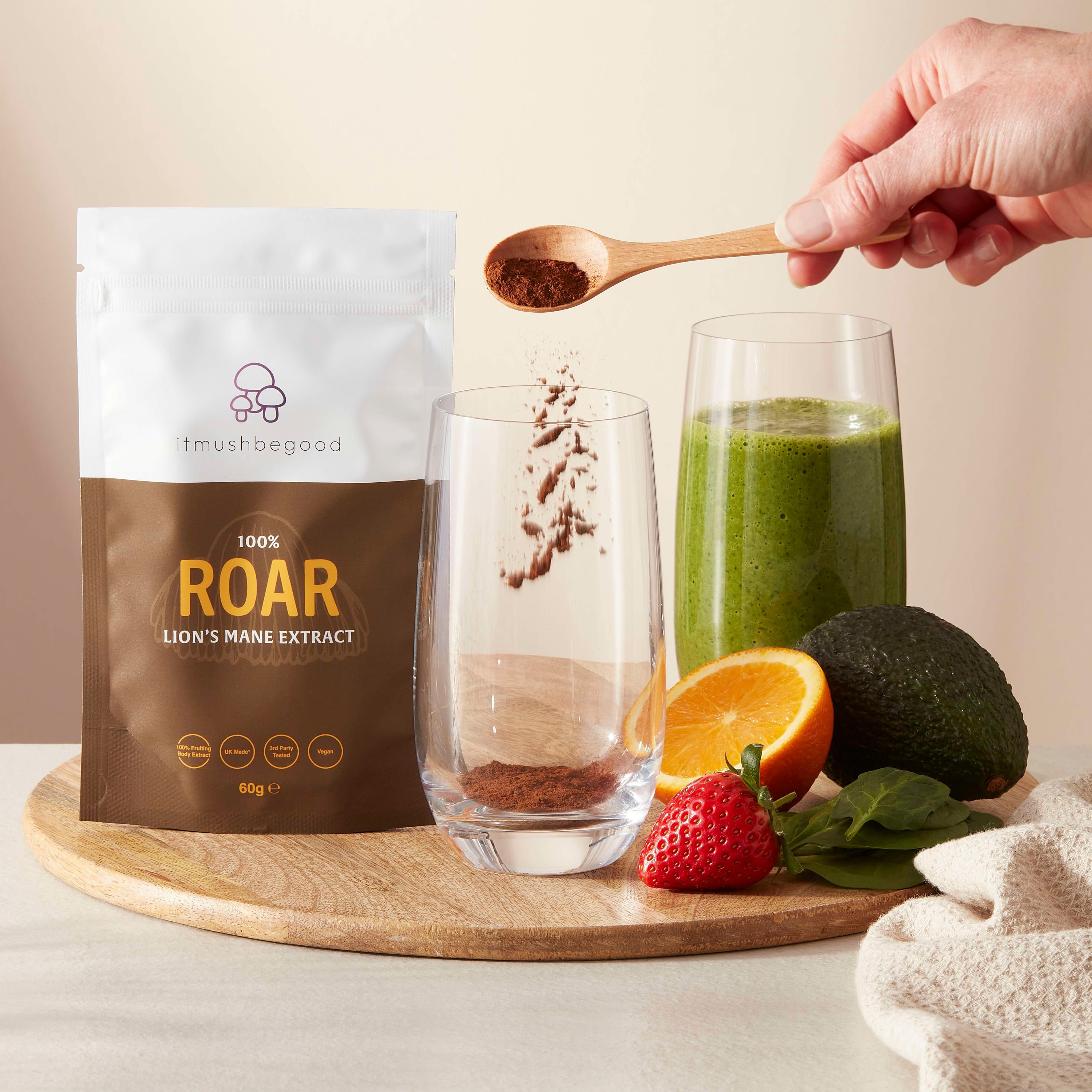 Roar packaging smoothie with powder being poured in the glass